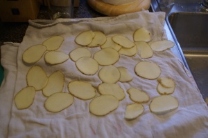 Thinly sliced potatoes for chips